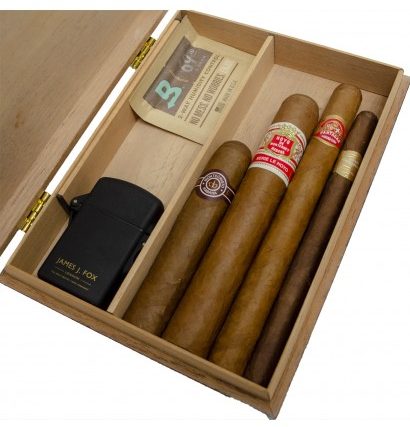 Some cigars in a gift humidor with a James J. Fox jet lighter and bodeva