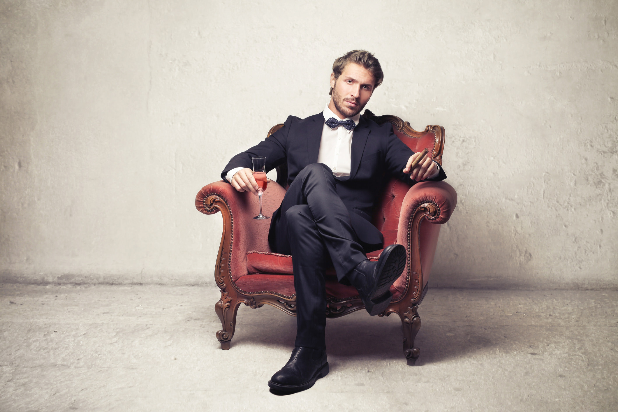 Man in Chair with Cigar